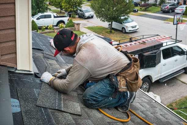 Professional Emergency Roof Repair technician working in Sterling, IL